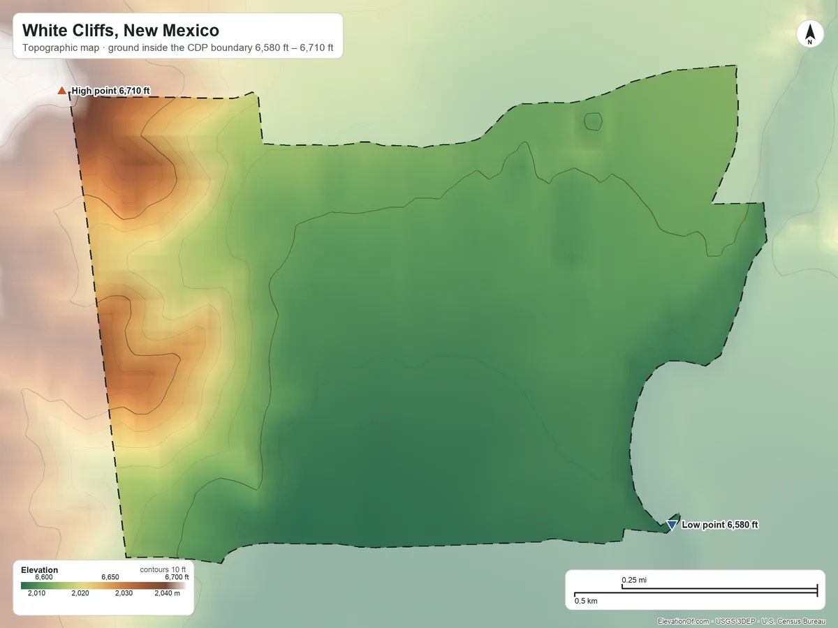 Topographic elevation map of White Cliffs, New Mexico, shaded from 6,580 ft on the east side to 6,710 ft on the northwest edge, below higher ground just outside