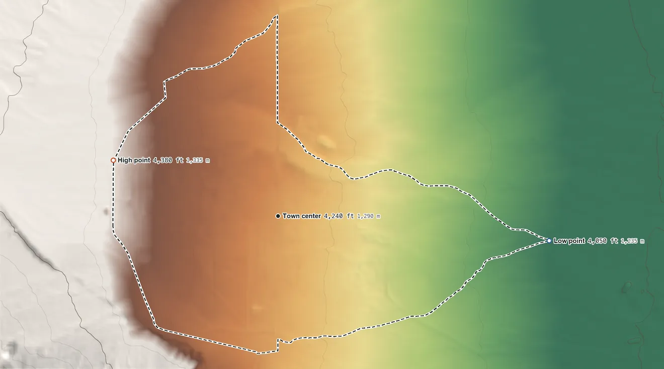 Topographic elevation map of White Sands, New Mexico, shaded from 4,050 ft on the east side to 4,380 ft at the foot of the San Augustin Mountains