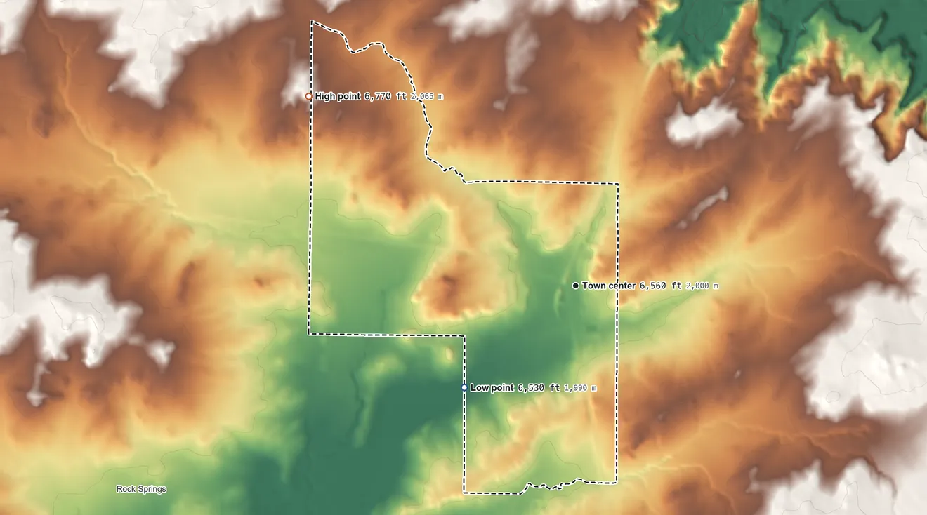 Topographic elevation map of Yah-ta-hey, New Mexico, shaded from 6,530 ft on the southwest side to 6,770 ft on the northwest side