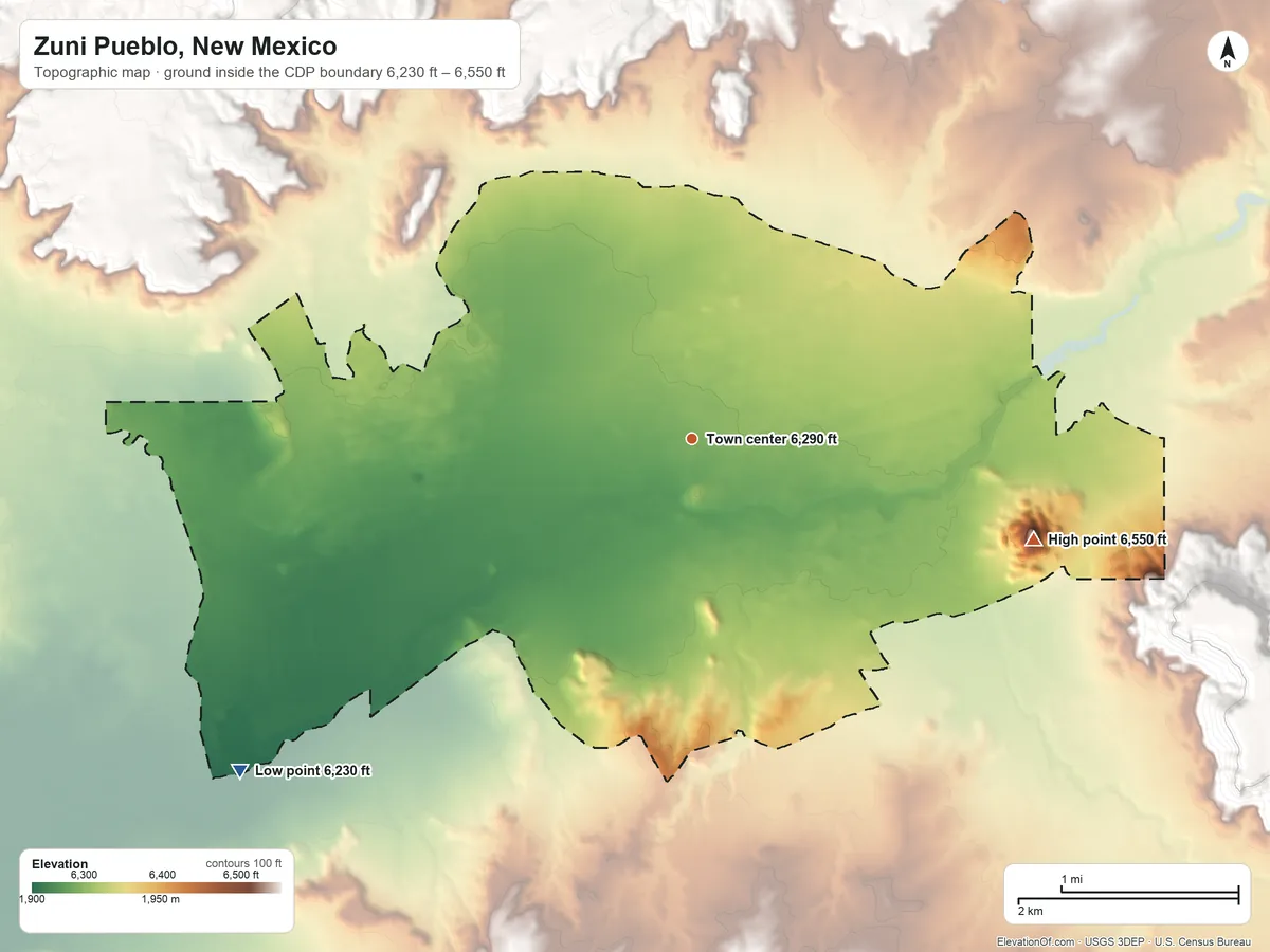 Topographic elevation map of Zuni Pueblo, New Mexico, shaded from 6,230 ft on the southwest side to 6,550 ft on the east edge, below higher ground just outside