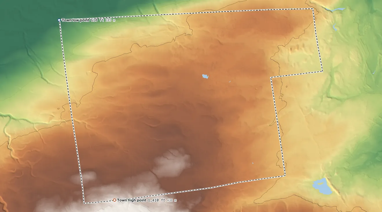 Topographic elevation map of Clinton, Clinton County, New York, shaded from 610 ft on the northwest side to 1,410 ft on the southwest side
