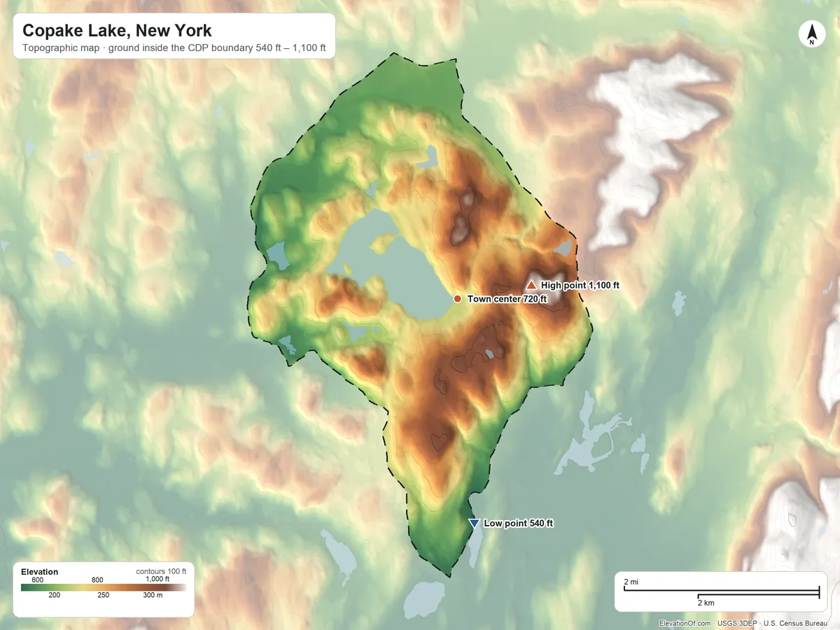 Topographic elevation map of Copake Lake, New York, shaded from 540 ft on the south side to 1,100 ft on Center Hill