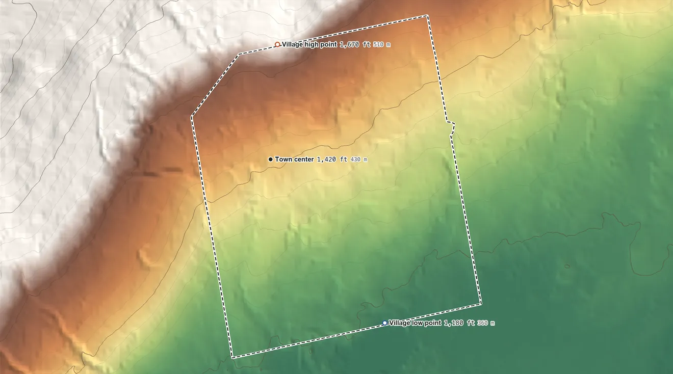Topographic elevation map of Village of Dannemora, New York, shaded from 1,180 ft on the southeast side to 1,670 ft on the north edge, below higher ground just outside