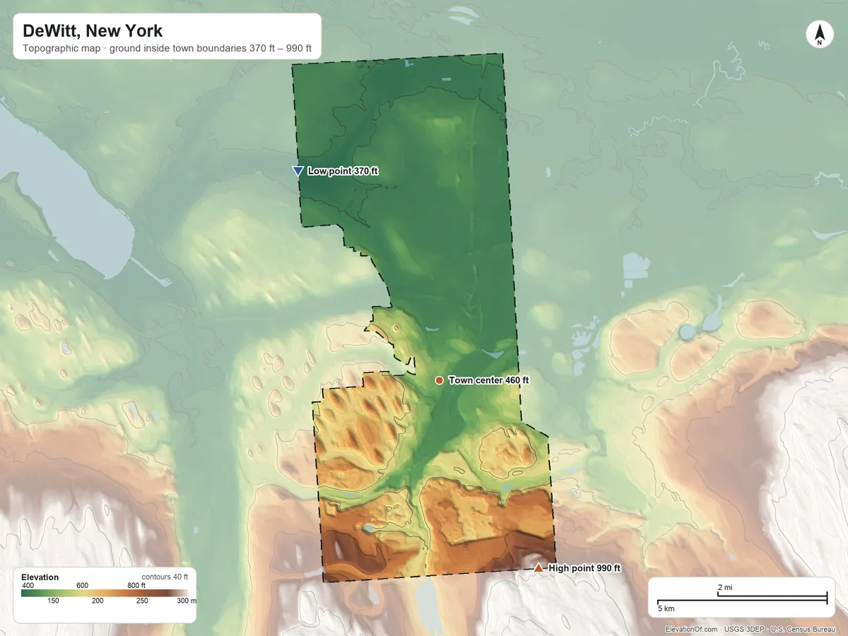 Topographic elevation map of DeWitt, New York, shaded from 370 ft on the northwest side to 990 ft on the southeast edge, below higher ground just outside