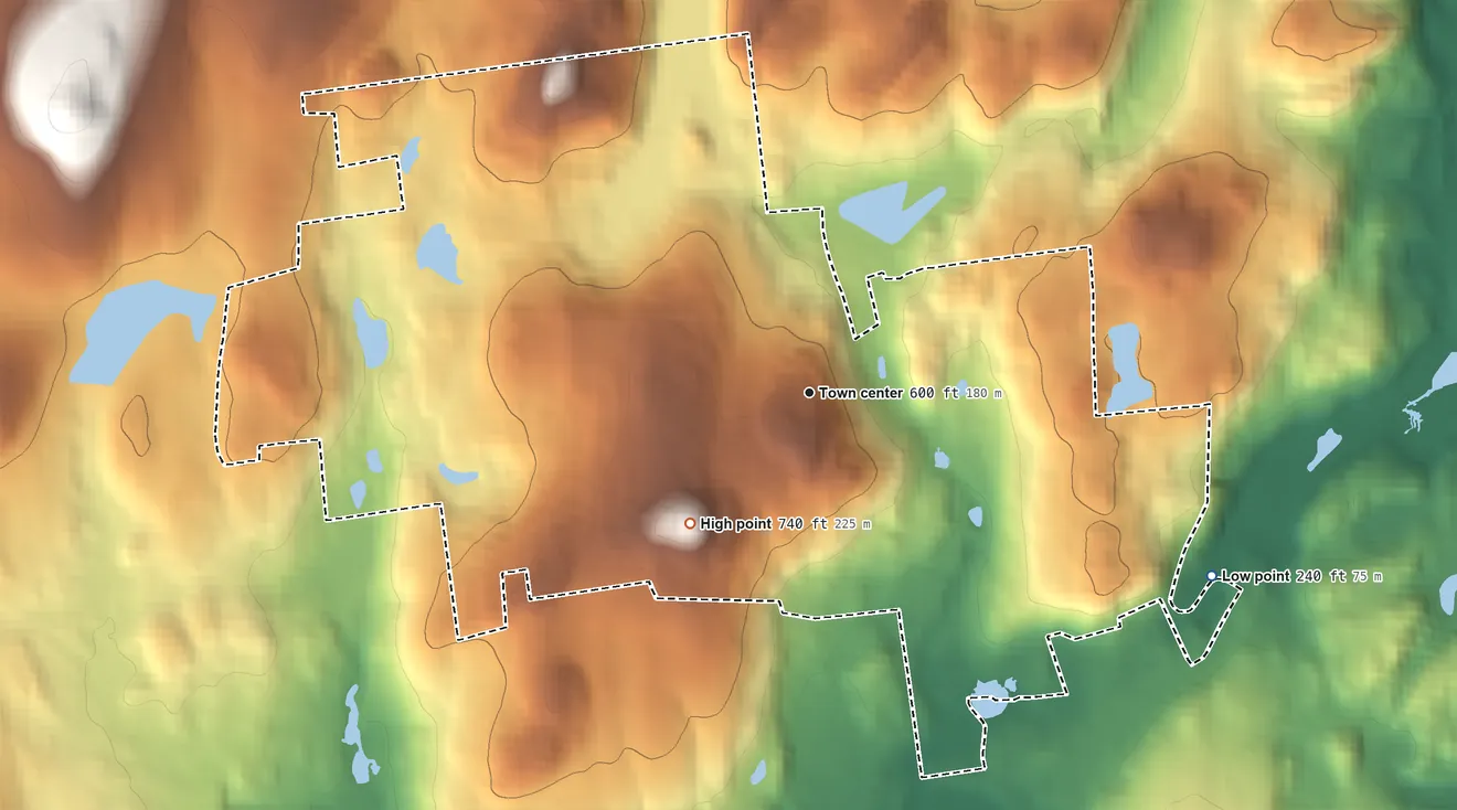 Topographic elevation map of Heritage Hills, New York, shaded from 240 ft on the southeast side to 740 ft on Round Top
