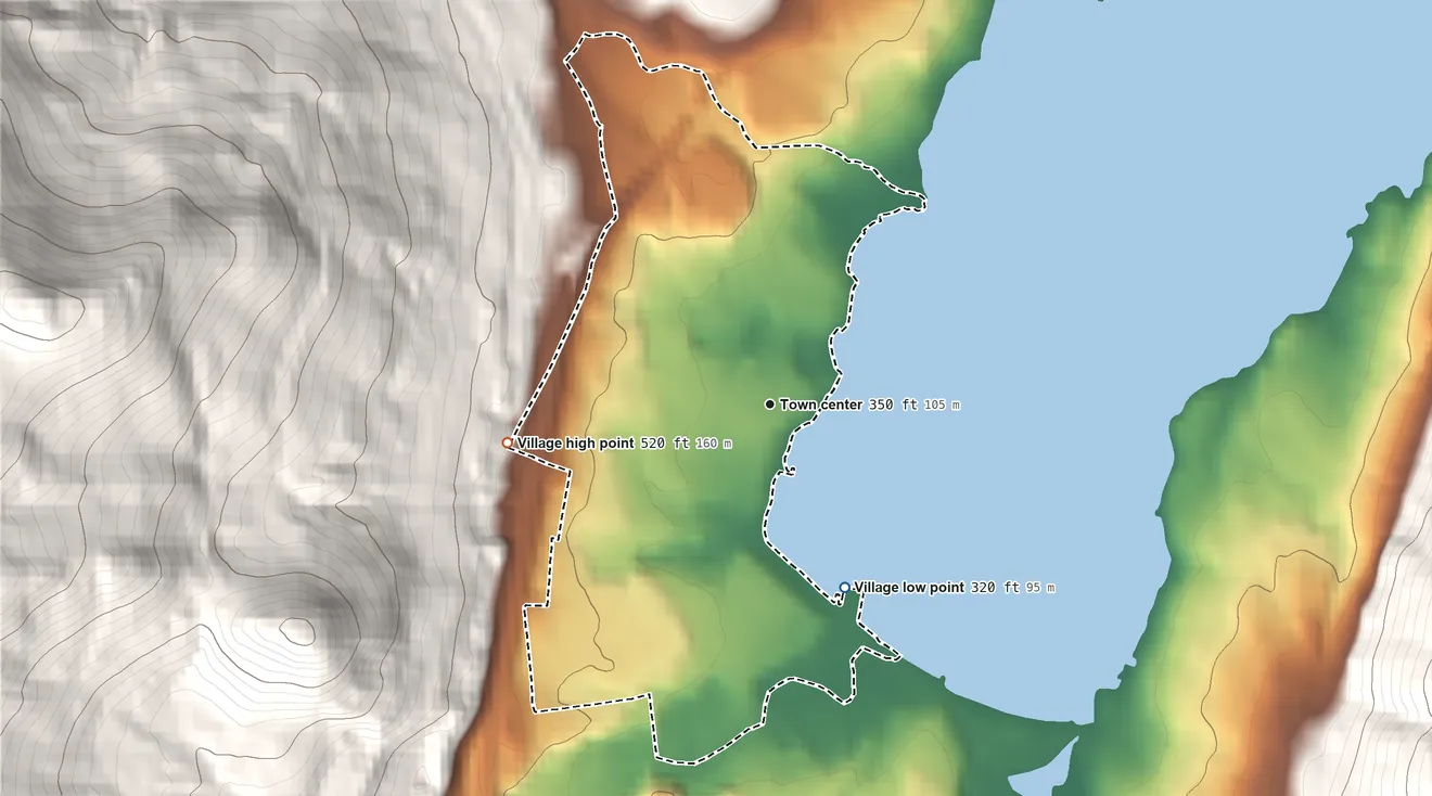 Topographic elevation map of Village of Lake George, New York, shaded from 320 ft on the south side to 520 ft at the foot of the Luzerne Mountains