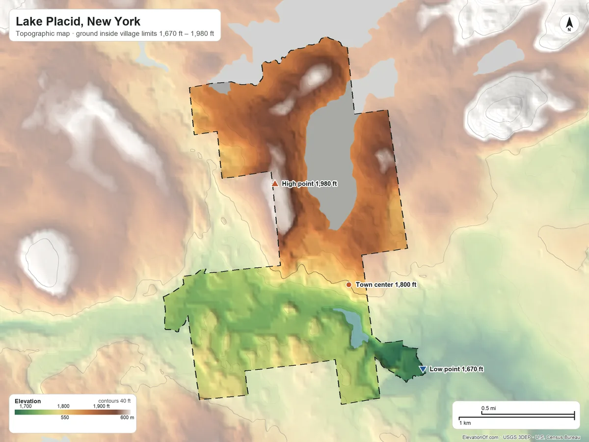 Topographic elevation map of Lake Placid, New York, shaded from 1,670 ft on the southeast side to 1,980 ft at the foot of the Sentinel Range