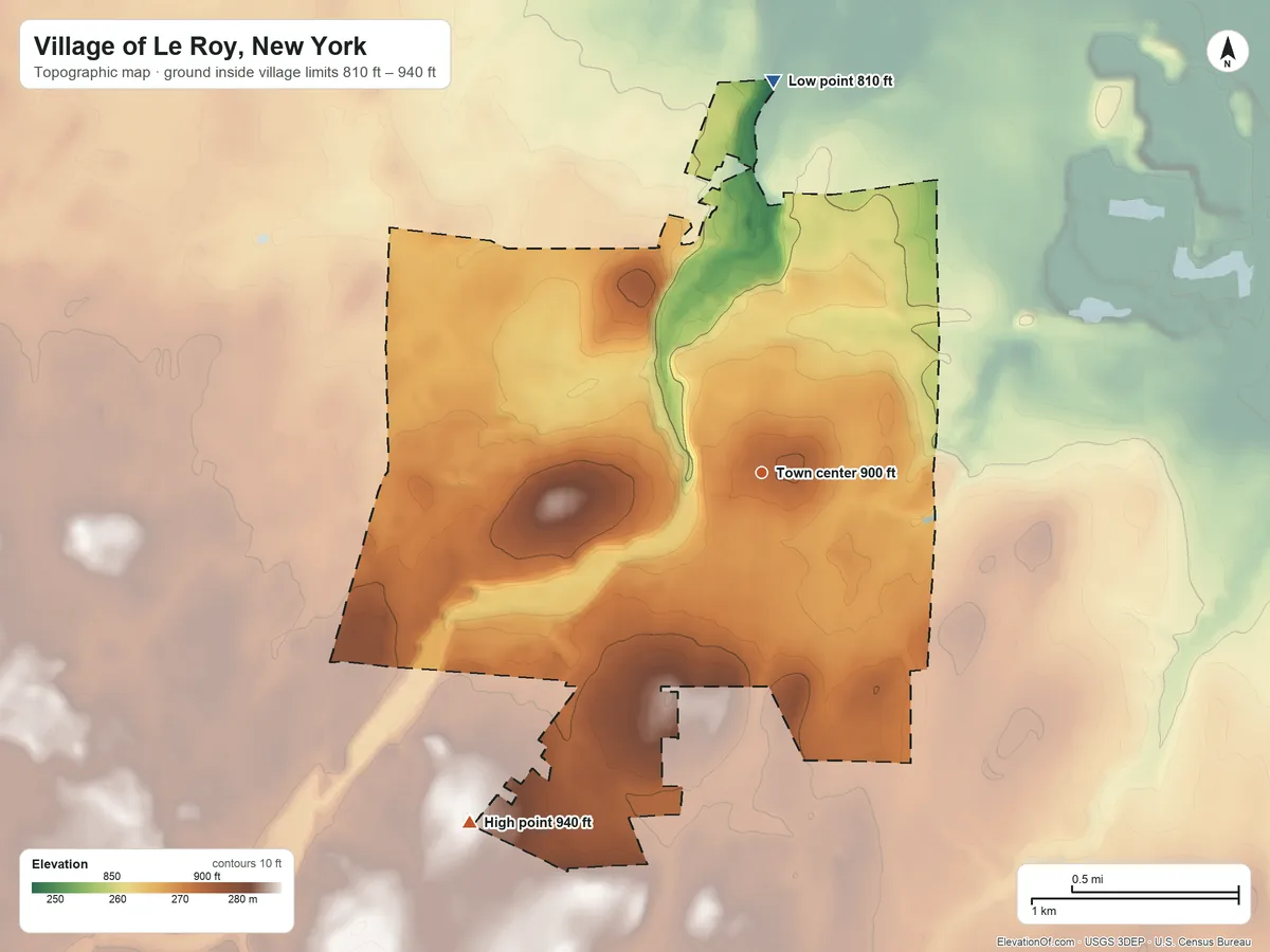 Topographic elevation map of Village of Le Roy, New York, shaded from 810 ft on the north side to 940 ft on the southwest side