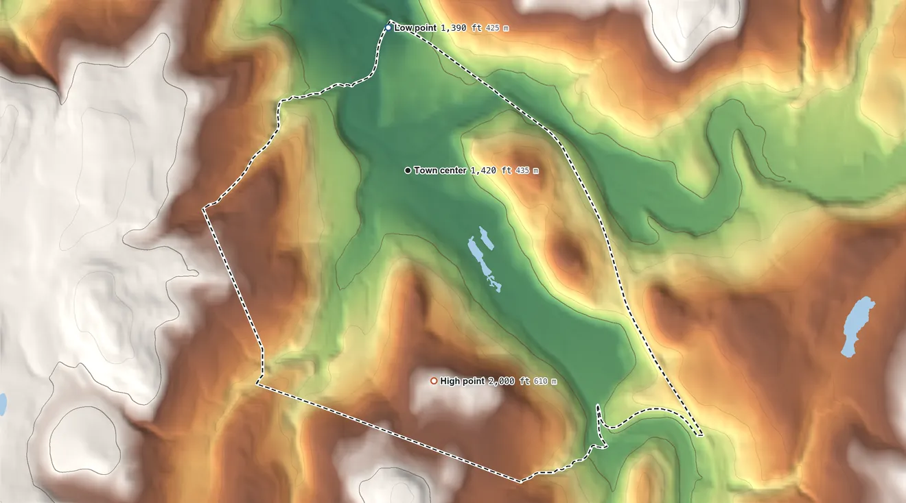 Topographic elevation map of Livingston Manor, New York, shaded from 1,390 ft on the north side to 2,000 ft on the south side