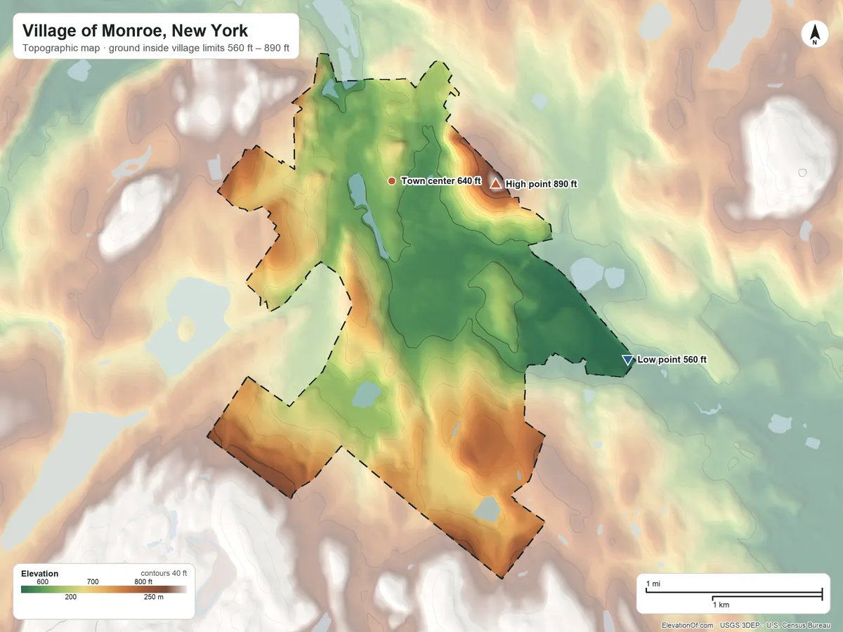 Topographic elevation map of Village of Monroe, New York, shaded from 560 ft on the southeast side to 890 ft on Bald Hill