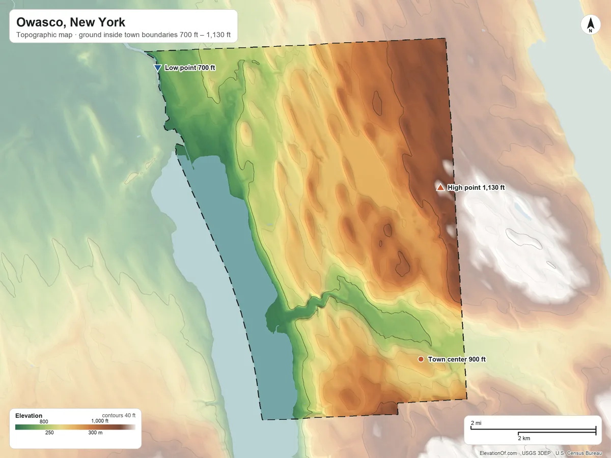 Topographic elevation map of Owasco, New York, shaded from 700 ft on the northwest side to 1,130 ft on the north side