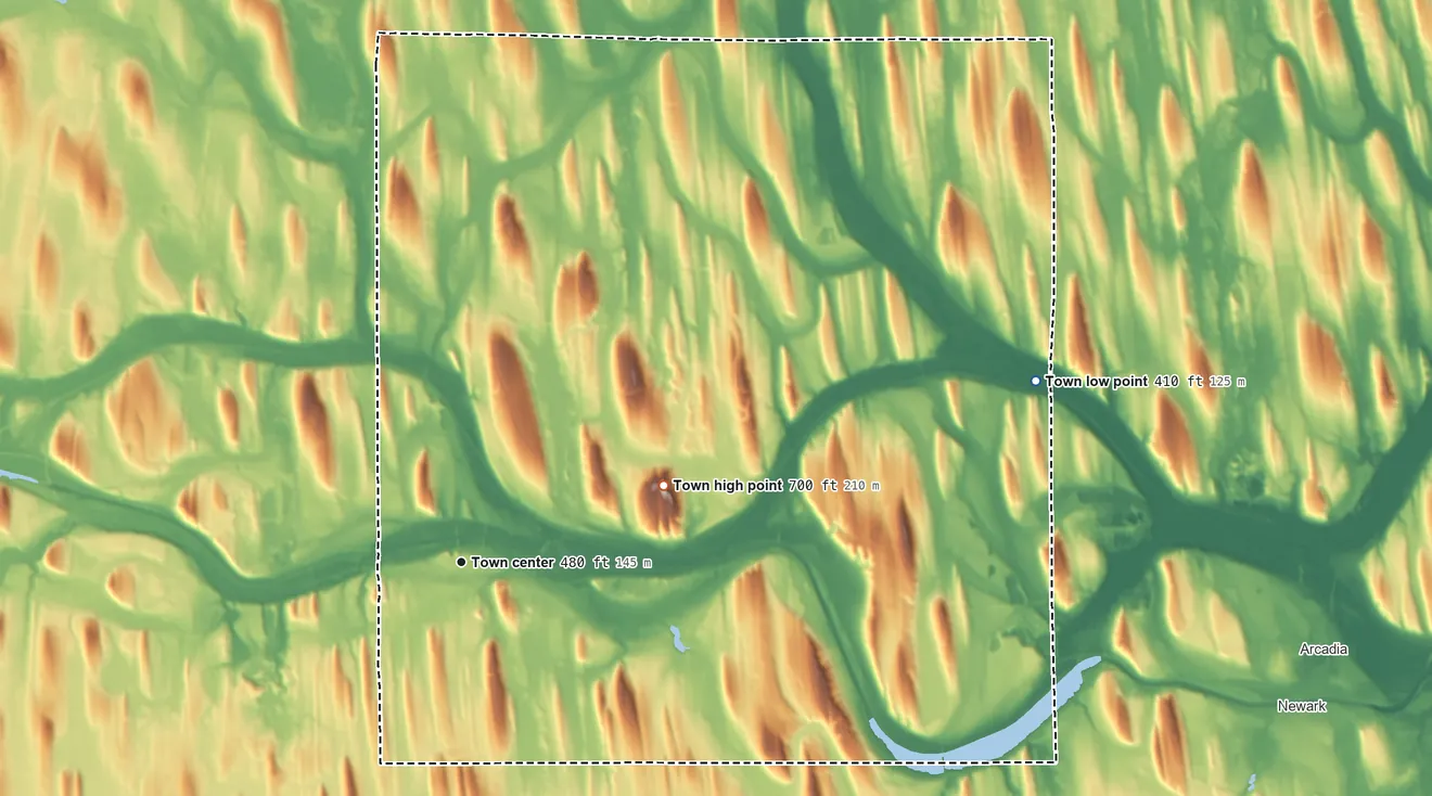Topographic elevation map of Palmyra, New York, shaded from 410 ft on the east side to 700 ft on the east side