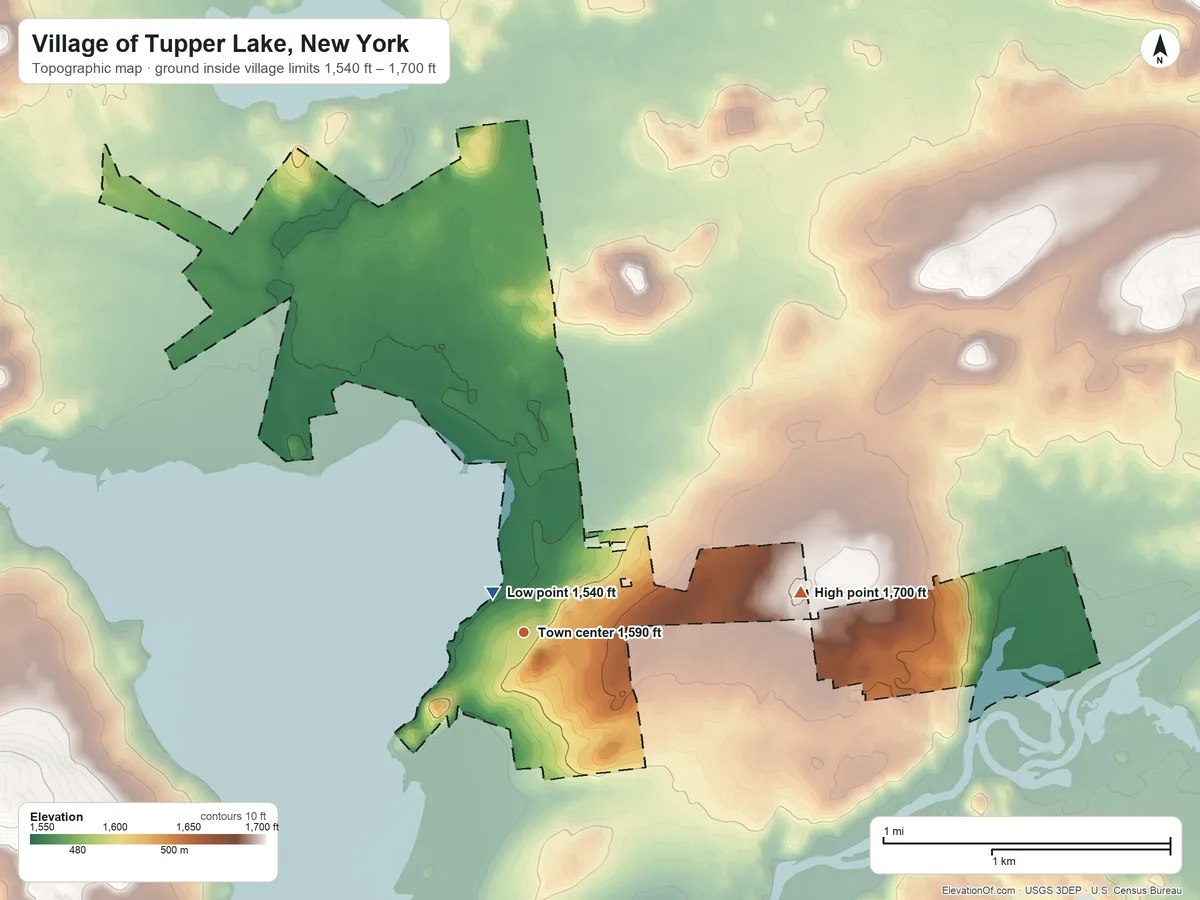 Topographic elevation map of Village of Tupper Lake, New York, shaded from 1,540 ft near the middle to 1,700 ft on the east side