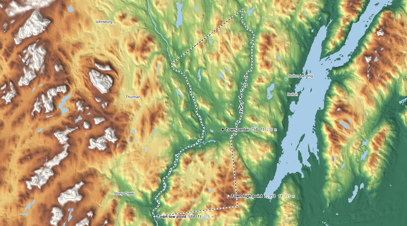 Topographic elevation map of Warrensburg, New York, shaded from 580 ft on the southwest side to 2,350 ft on Black Spruce Mountain
