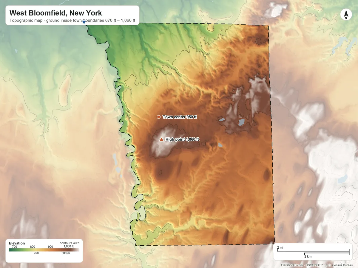 Topographic elevation map of West Bloomfield, New York, shaded from 670 ft on the northwest side to 1,060 ft near the middle