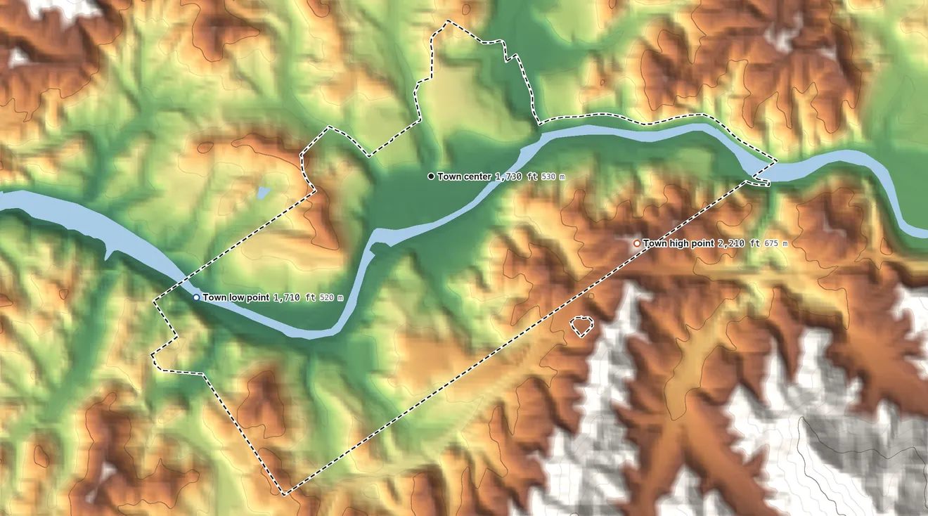 Topographic elevation map of Bryson City, North Carolina, shaded from 1,710 ft on the southwest side to 2,210 ft on the east edge, below higher ground just outside