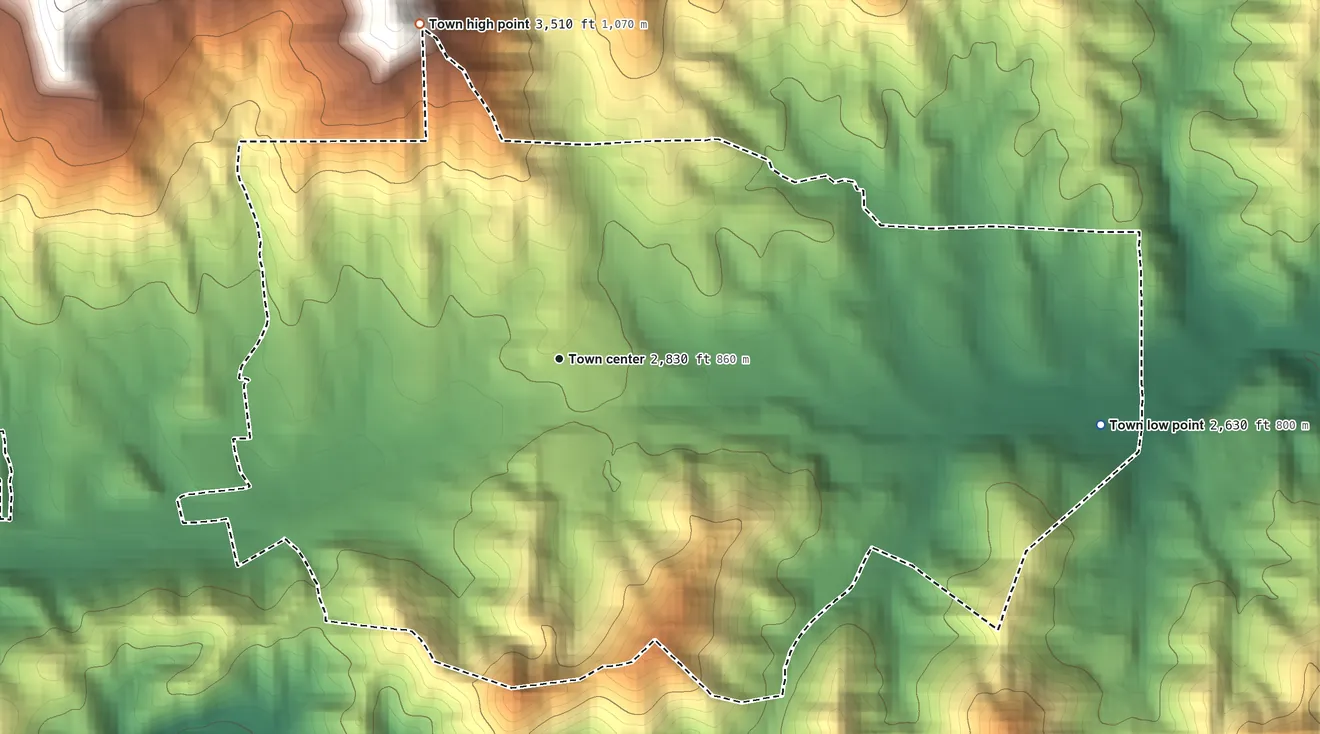 Topographic elevation map of Burnsville, North Carolina, shaded from 2,630 ft on the east side to 3,510 ft at the foot of the Green Mountains