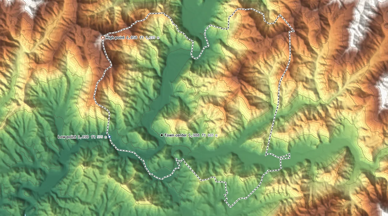 Topographic elevation map of Cherokee, North Carolina, shaded from 1,890 ft on the west side to 4,050 ft on Mount Noble
