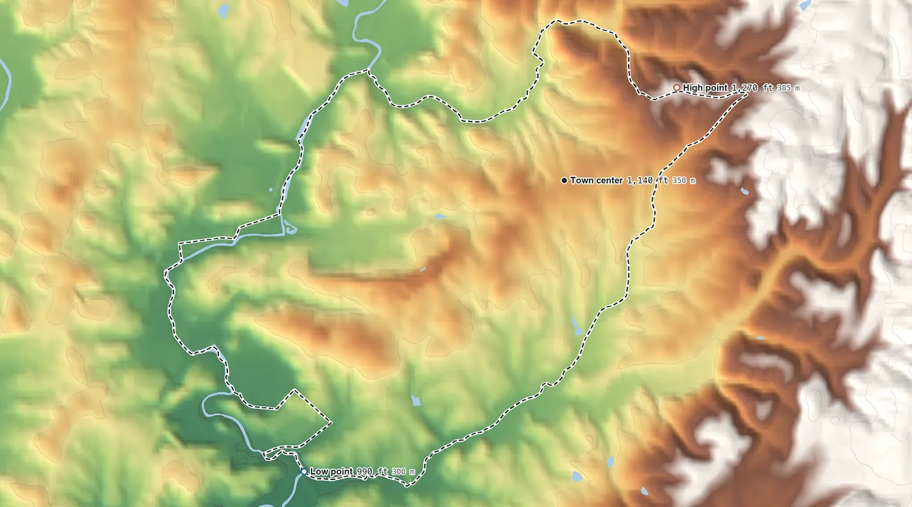 Topographic elevation map of Flat Rock, Surry County, North Carolina, shaded from 990 ft on the southwest side to 1,270 ft on the northeast edge, below higher ground just outside