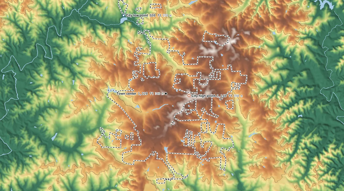 Topographic elevation map of King, North Carolina, shaded from 880 ft on the northwest side to 1,140 ft on the east side