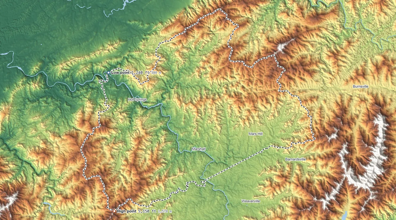 Topographic elevation map of Madison County, North Carolina, shaded from 1,240 ft on the northwest side to 5,150 ft on Sandymush Bald