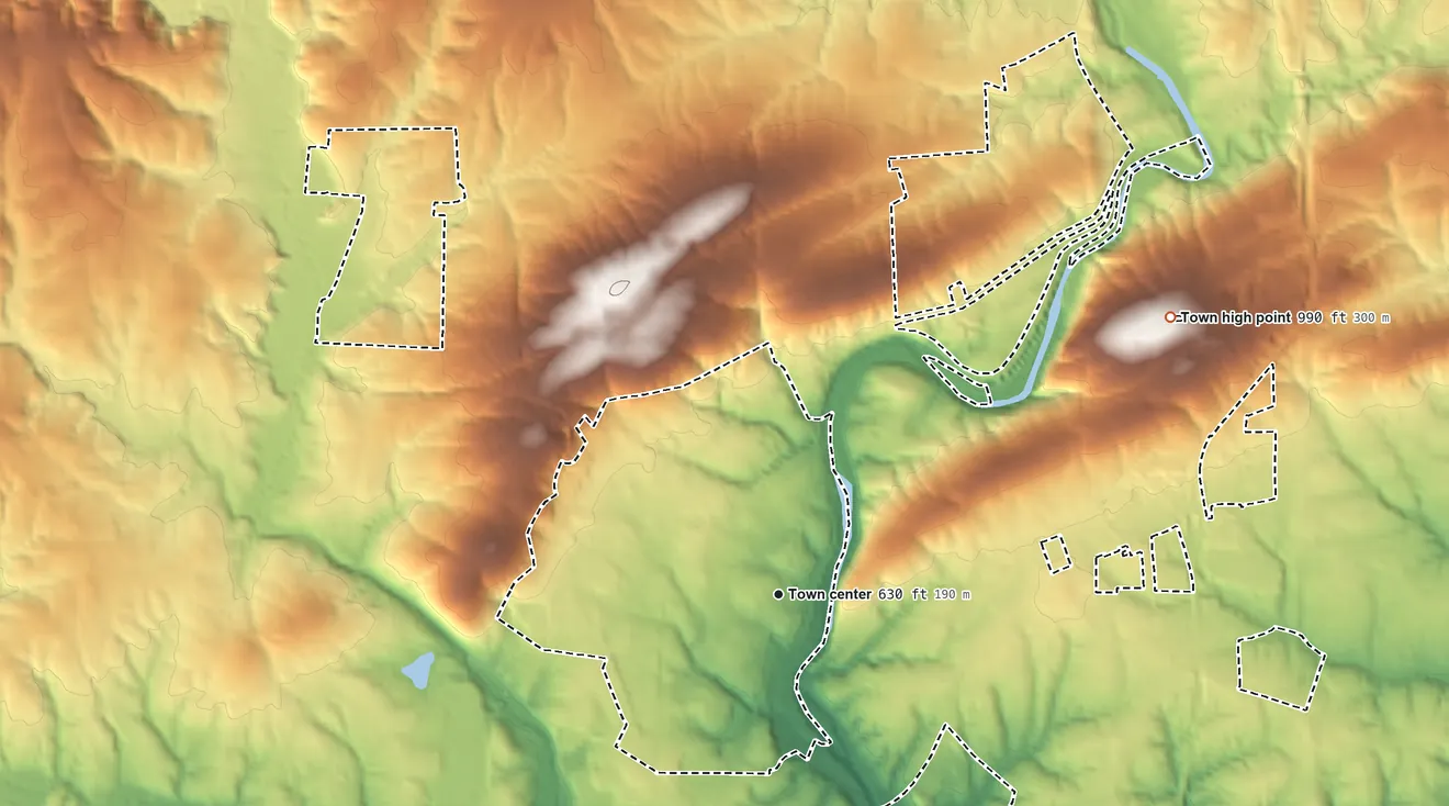 Topographic elevation map of Mayodan, North Carolina, shaded from 540 ft on the southeast side to 990 ft on the northeast edge, below higher ground just outside