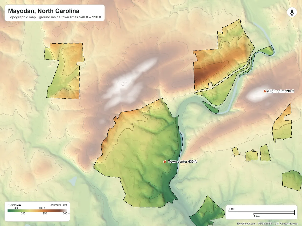 Topographic elevation map of Mayodan, North Carolina, shaded from 540 ft on the southeast side to 990 ft on the northeast edge, below higher ground just outside