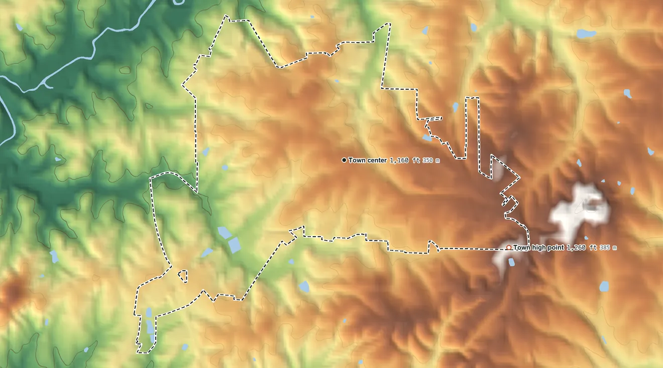 Topographic elevation map of Pilot Mountain, North Carolina, shaded from 950 ft on the west side to 1,260 ft on the southeast side