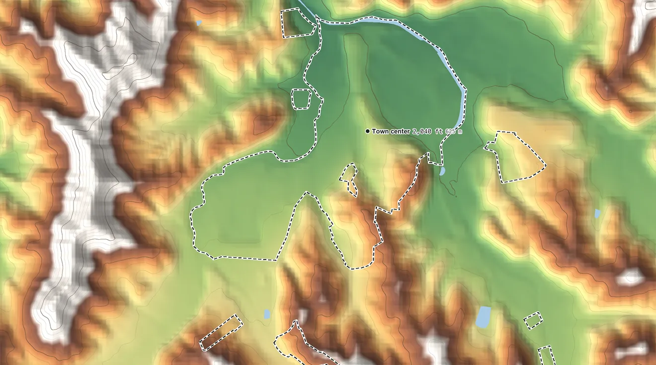 Topographic elevation map of Robbinsville, North Carolina, shaded from 1,950 ft on the north side to 2,320 ft at the foot of the Cheoah Mountains
