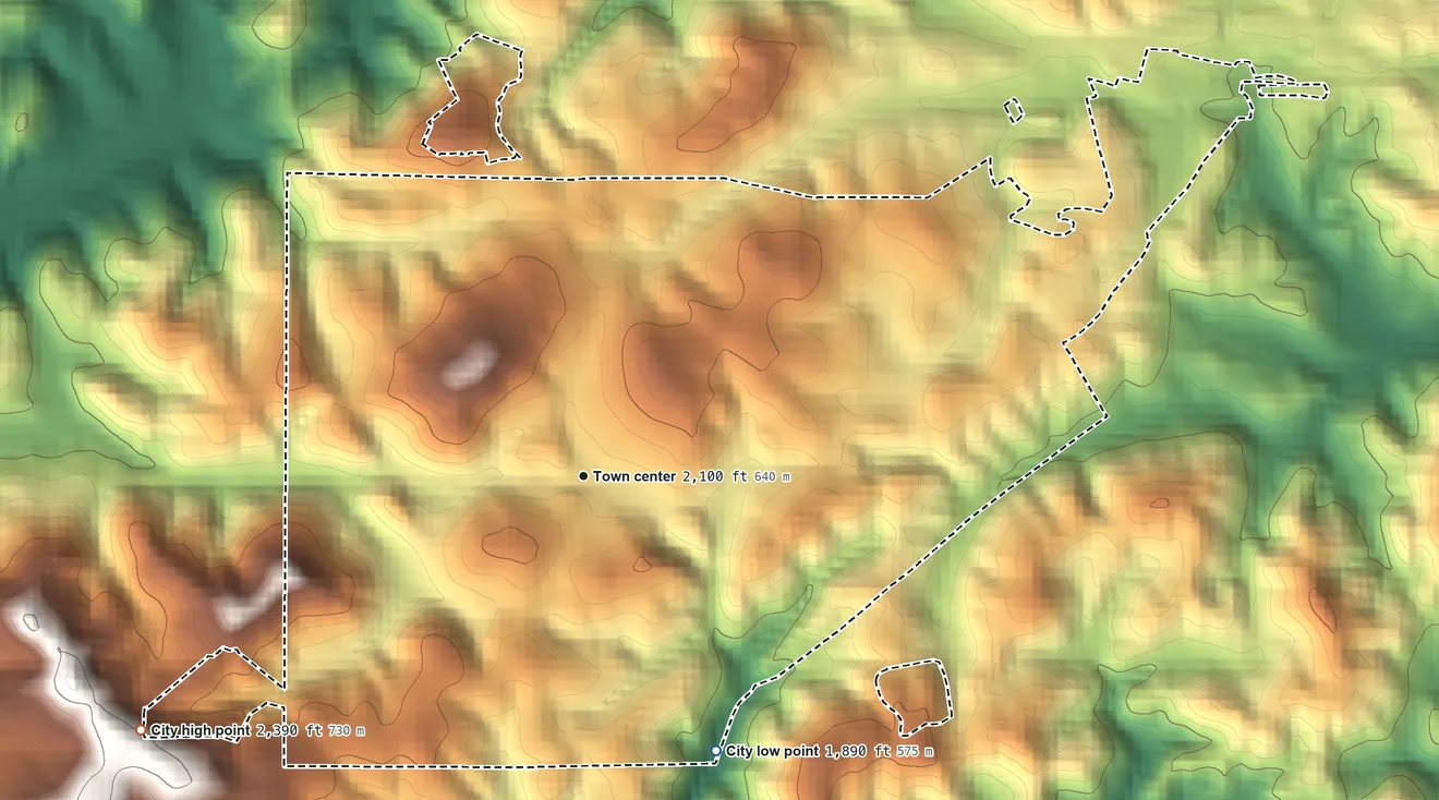 Topographic elevation map of Saluda, North Carolina, shaded from 1,890 ft on the southeast side to 2,390 ft on the southwest side