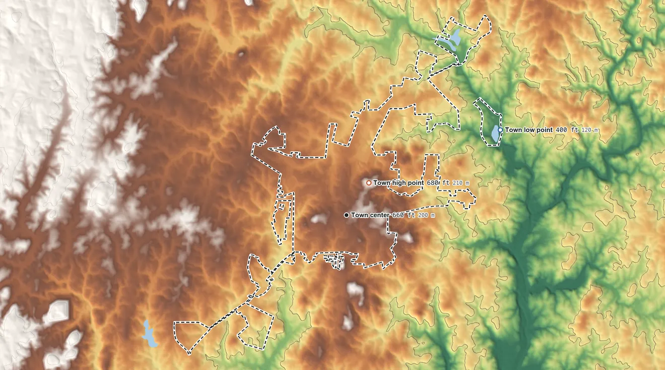 Topographic elevation map of Troy, North Carolina, shaded from 400 ft on the northeast side to 680 ft near the middle
