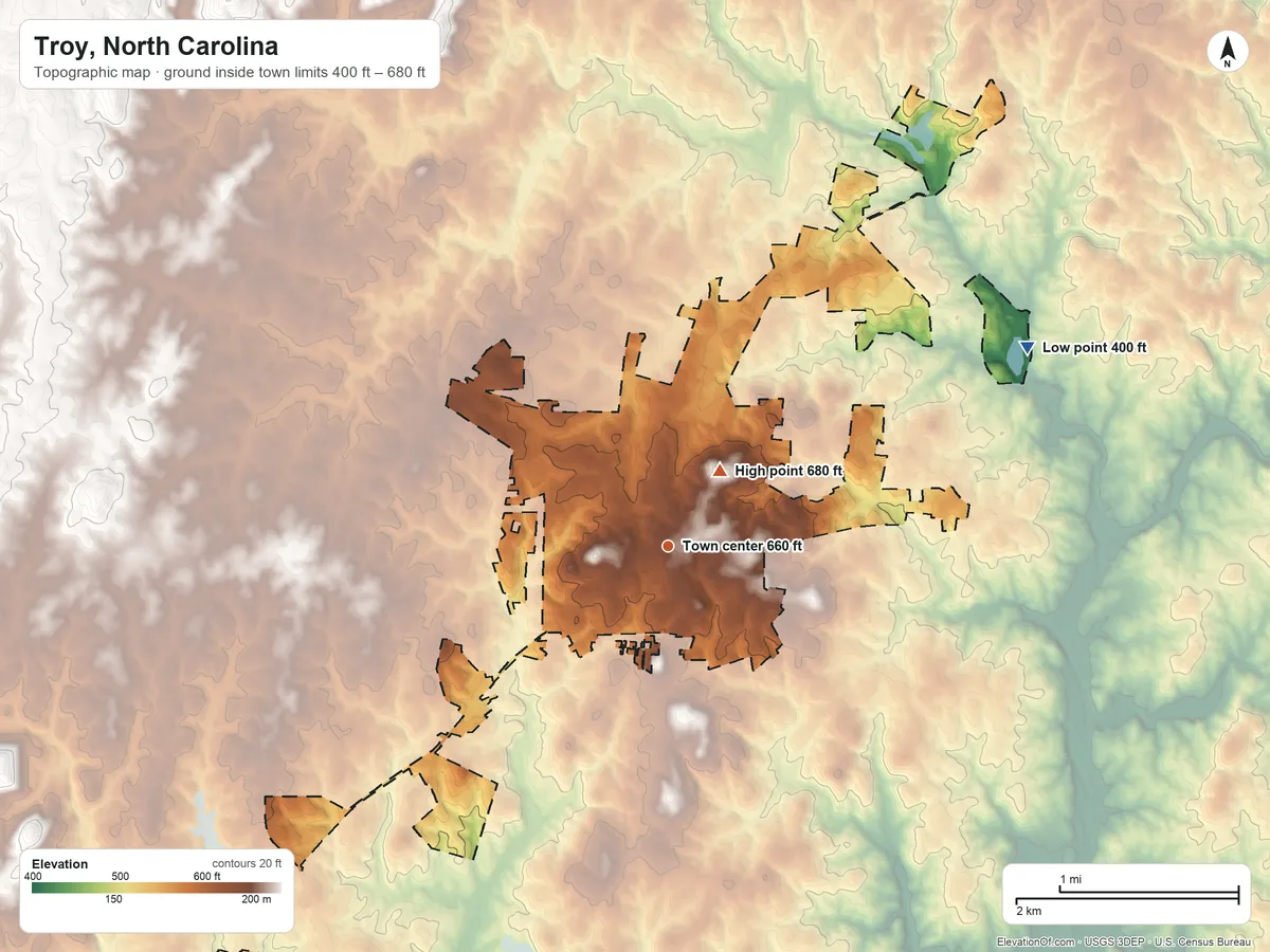 Topographic elevation map of Troy, North Carolina, shaded from 400 ft on the northeast side to 680 ft near the middle