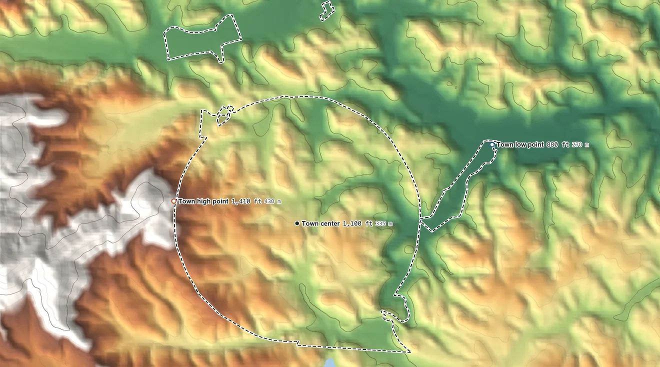 Topographic elevation map of Tryon, North Carolina, shaded from 880 ft on the east side to 1,410 ft on the west edge, below higher ground just outside