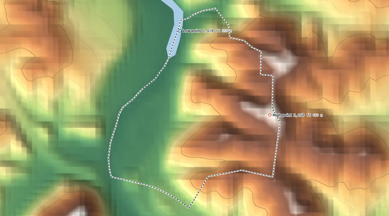 Topographic elevation map of Whittier, North Carolina, shaded from 1,820 ft on the north side to 2,160 ft on the east edge, below higher ground just outside