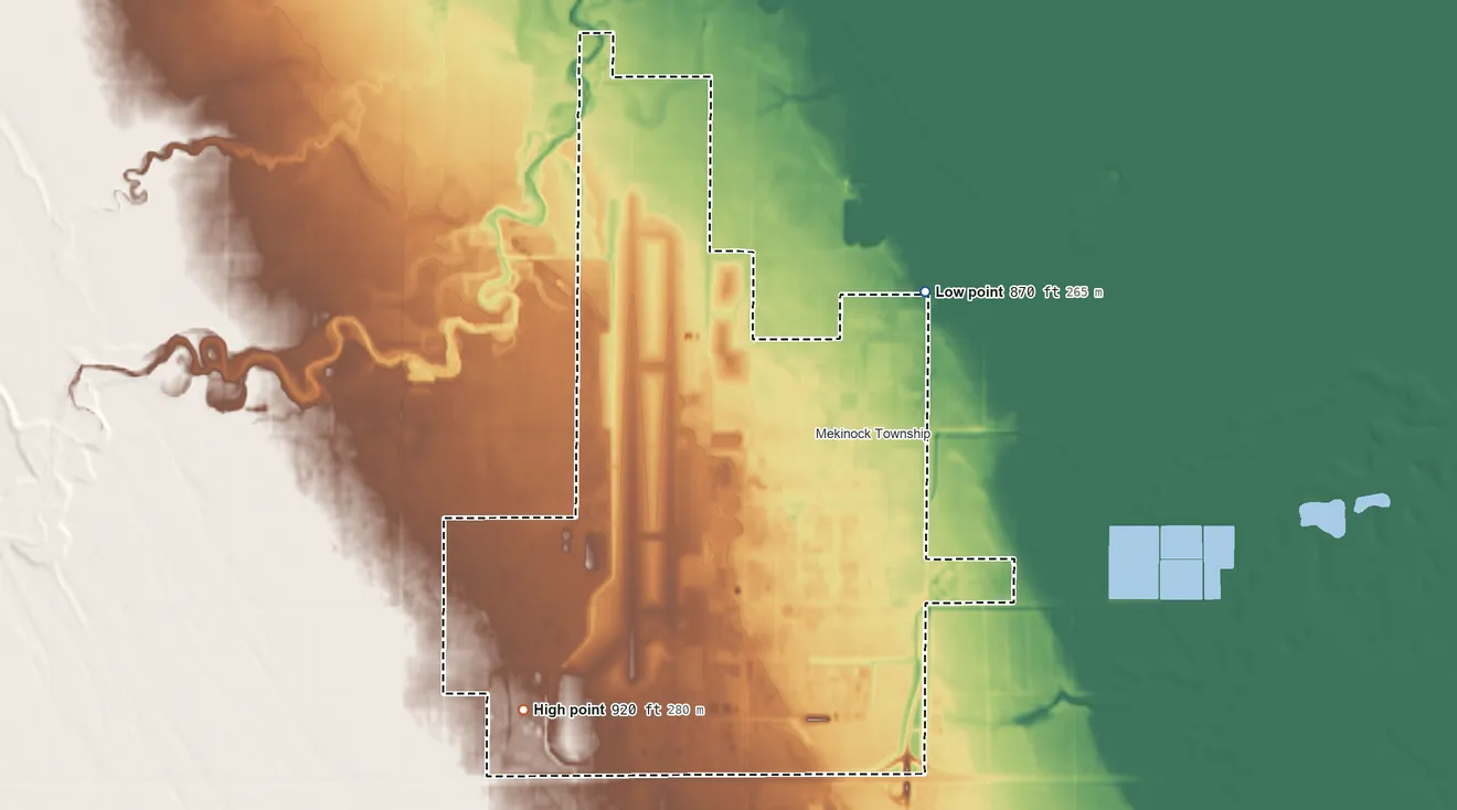 Topographic elevation map of Grand Forks AFB, North Dakota, shaded from 870 ft on the north side to 920 ft on the southwest side