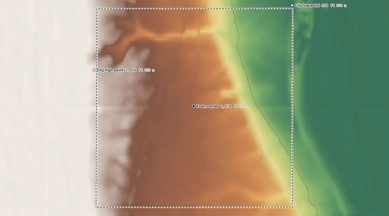 Topographic elevation map of Inkster, North Dakota, shaded from 990 ft on the northeast side to 1,040 ft on the west side