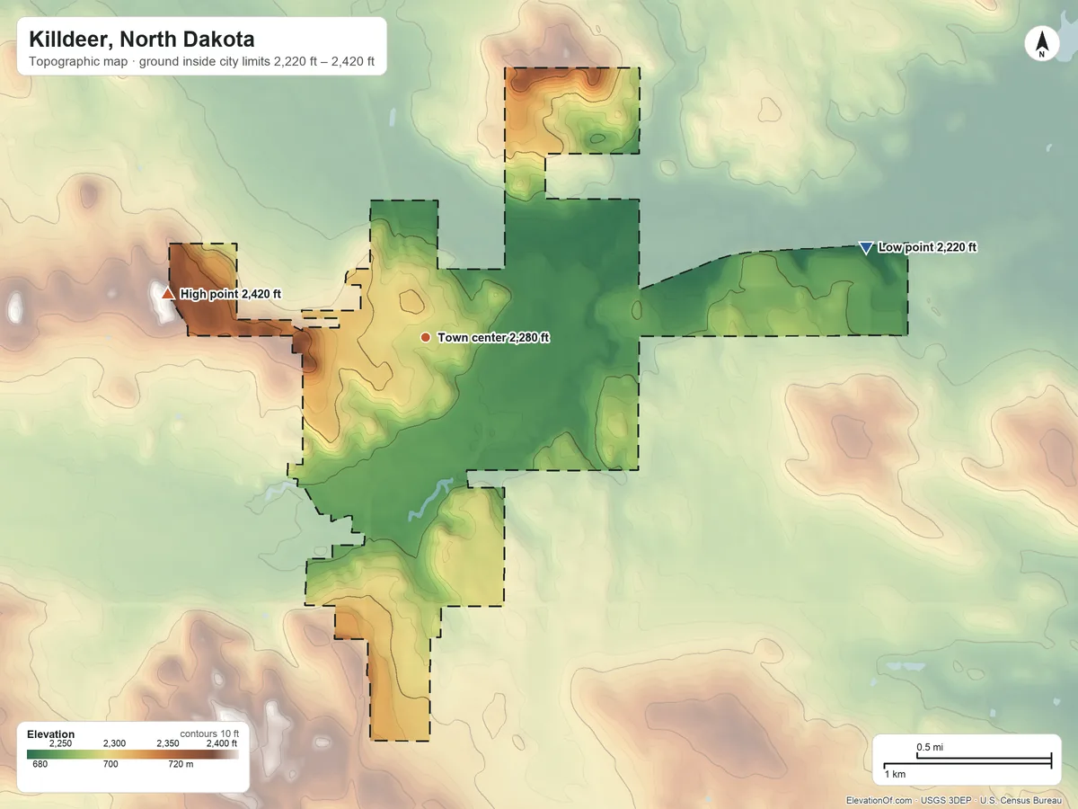 Topographic elevation map of Killdeer, North Dakota, shaded from 2,220 ft on the east side to 2,420 ft on the west side