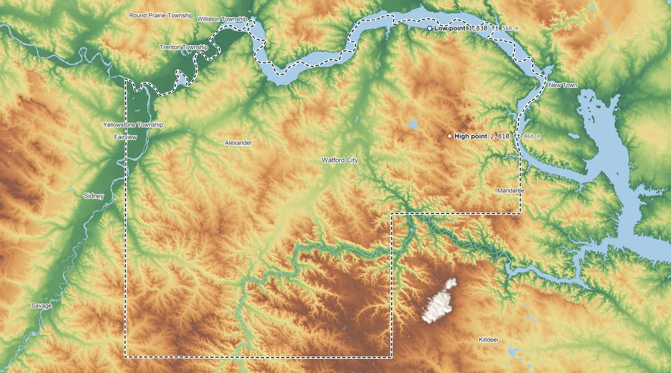 Topographic elevation map of McKenzie County, North Dakota, shaded from 1,830 ft on the northeast side to 2,810 ft on Saddle Butte