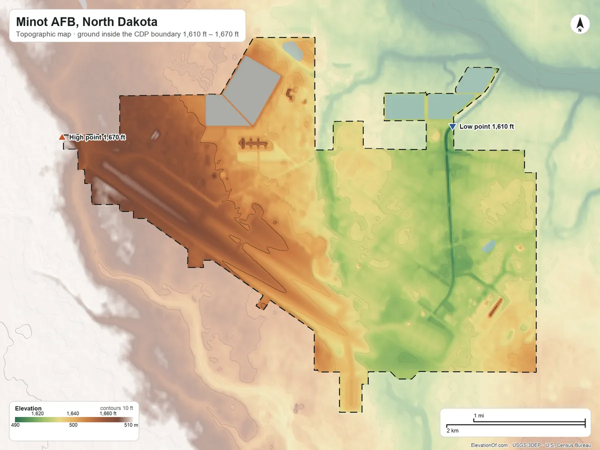 Topographic elevation map of Minot AFB, North Dakota, shaded from 1,610 ft on the north side to 1,670 ft on the west side