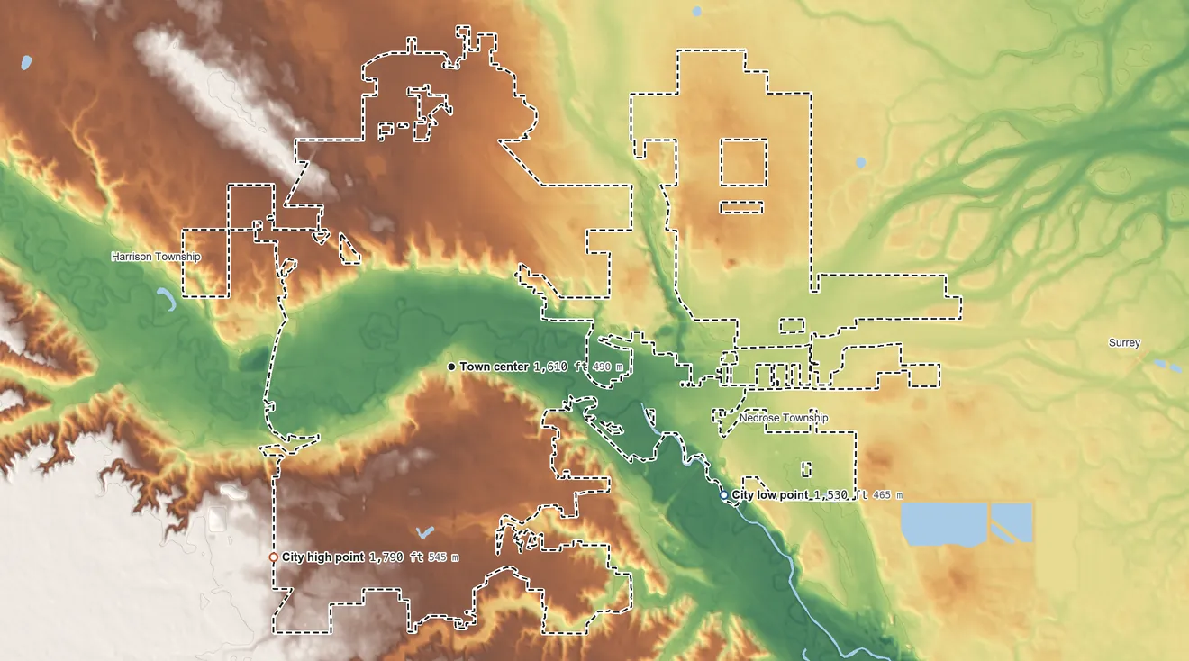 Topographic elevation map of Minot, North Dakota, shaded from 1,530 ft on the southeast side to 1,790 ft on the southwest side