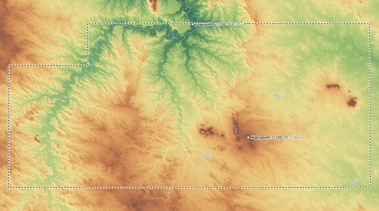 Topographic elevation map of Slope County, North Dakota, shaded from 2,390 ft on the north side to 3,500 ft on White Butte