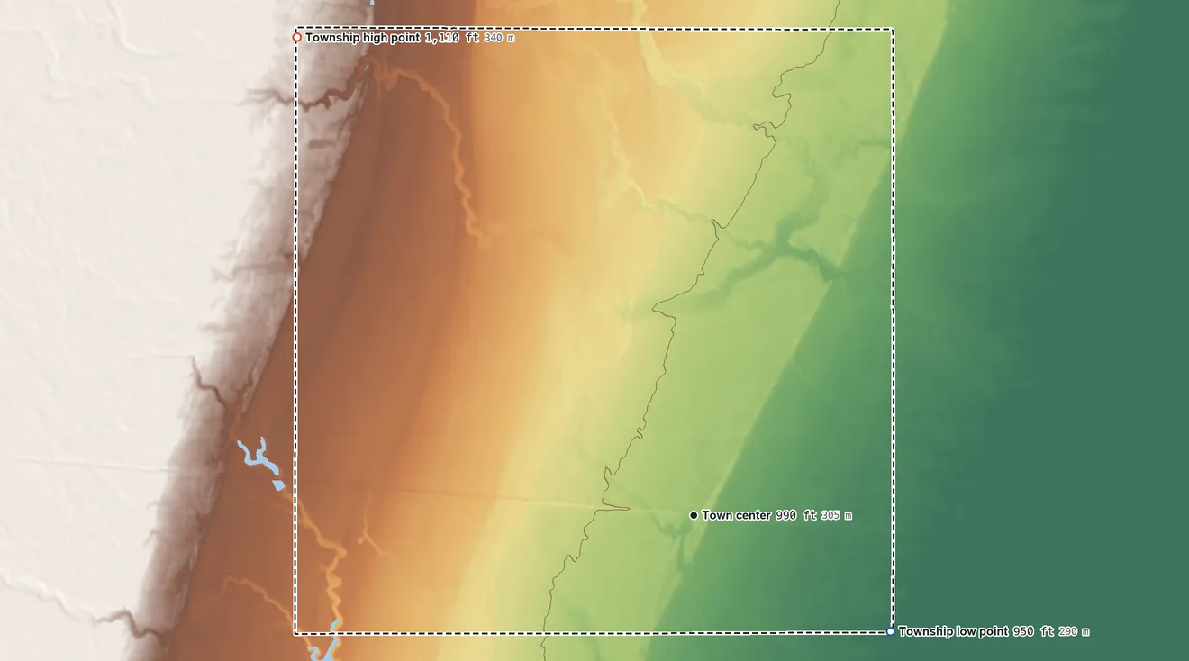 Topographic elevation map of Wheatland Township, North Dakota, shaded from 950 ft on the southeast side to 1,110 ft on the northwest side