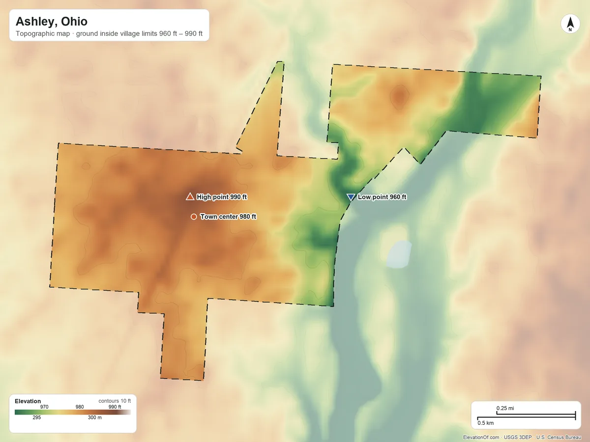 Topographic elevation map of Ashley, Ohio, shaded from 960 ft on the east side to 990 ft near the middle