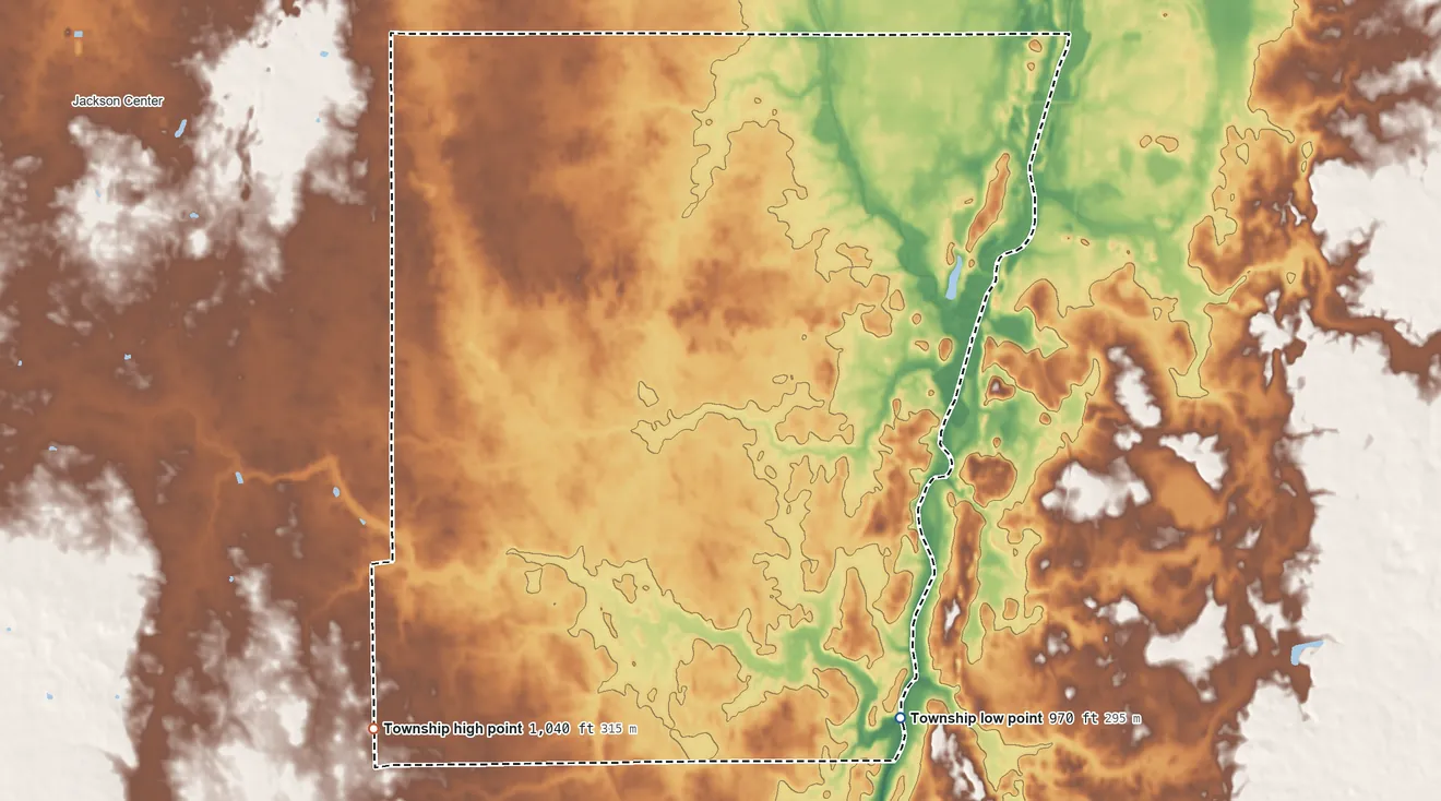 Topographic elevation map of Bloomfield Township, Logan County, Ohio, shaded from 970 ft on the southeast side to 1,040 ft on the southwest side