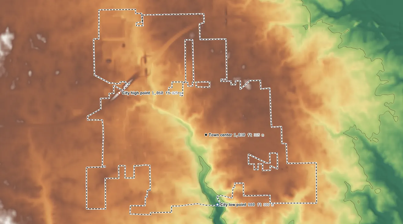 Topographic elevation map of Brookville, Ohio, shaded from 980 ft on the south side to 1,060 ft on the northwest side