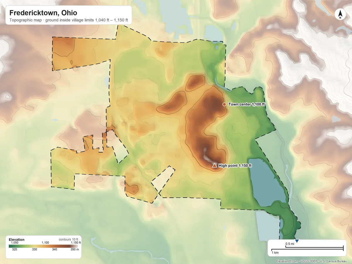 Topographic elevation map of Fredericktown, Ohio, shaded from 1,040 ft on the southeast side to 1,150 ft on Rowley Mound