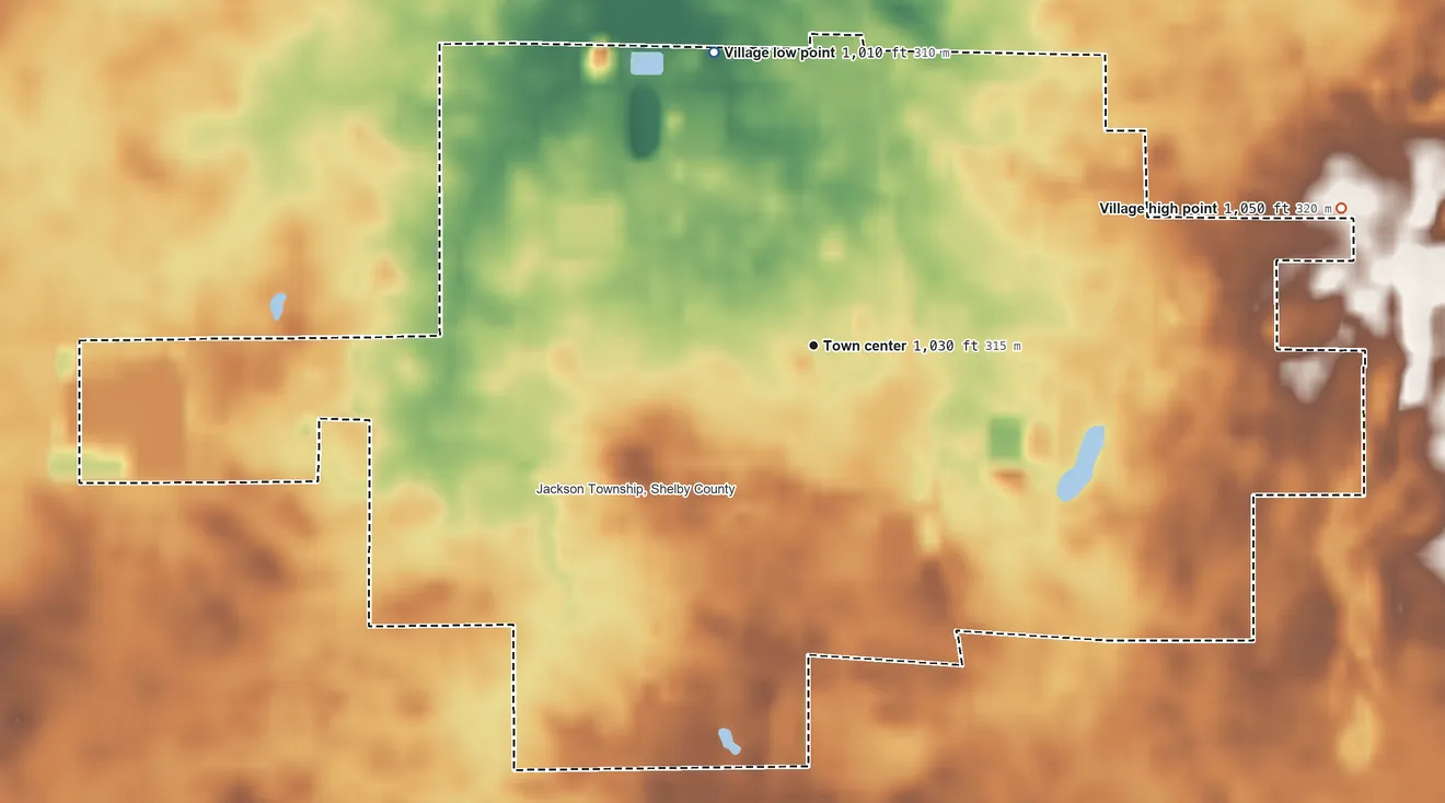 Topographic elevation map of Jackson Center, Ohio, shaded from 1,010 ft on the north side to 1,050 ft on the east side