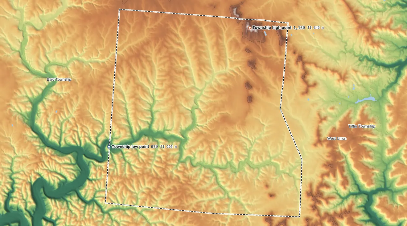 Topographic elevation map of Liberty Township, Adams County, Ohio, shaded from 670 ft on the west side to 1,130 ft on Cave Hill