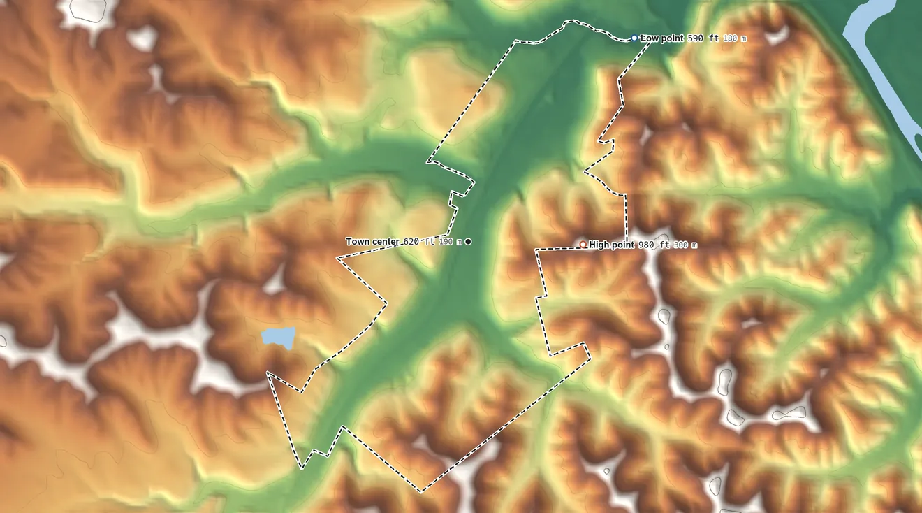 Topographic elevation map of Massieville, Ohio, shaded from 590 ft on the northeast side to 980 ft on the east side