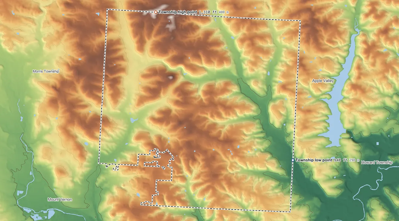 Topographic elevation map of Monroe Township, Knox County, Ohio, shaded from 940 ft on the southeast side to 1,310 ft on the north side